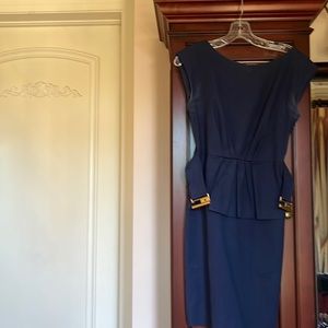 Belted peplum navy dress